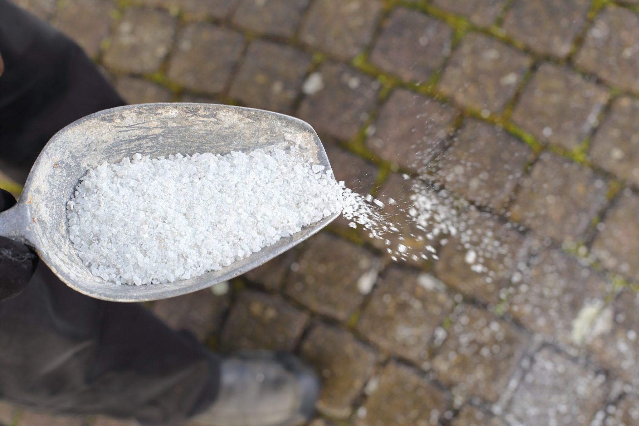 How To Get Rid Of Ice On Your Driveway (Salt Free Tips)